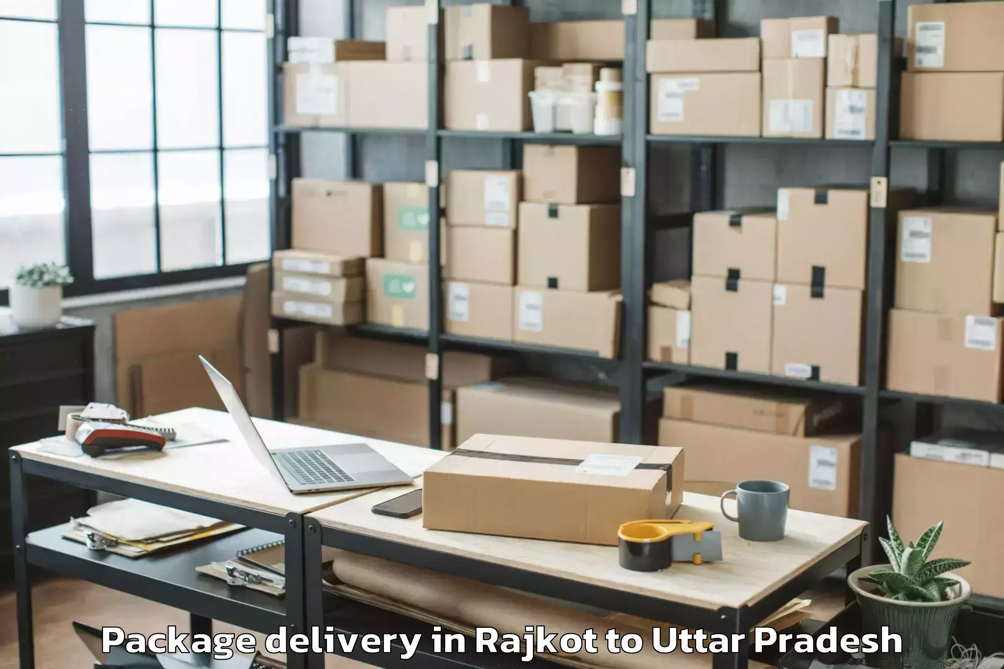 Book Rajkot to Dalmau Package Delivery